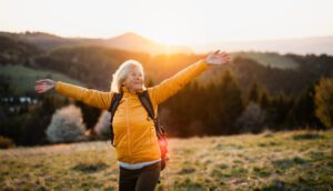 10 Proven Health Benefits of Turmeric and Curcumin 2 Happy midlife woman health benefits of turmeric